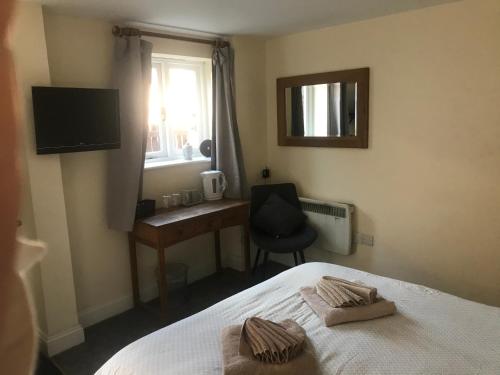 Katil atau katil-katil dalam bilik di The Swan Inn Newport