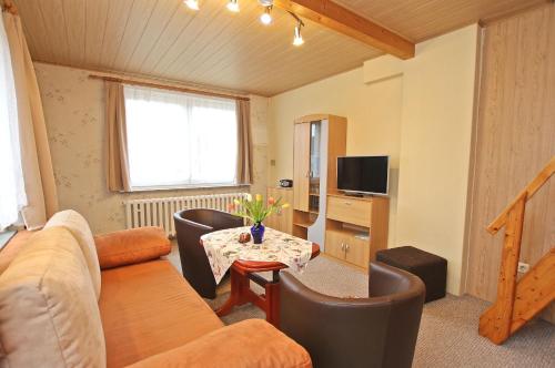 Svetainės erdvė apgyvendinimo įstaigoje Ferienwohnung Rheinsberg SEE 9851