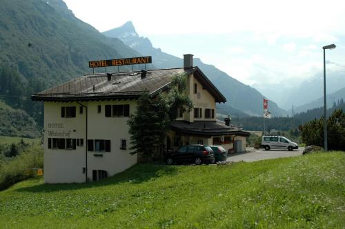 a building with a sign that reads hotel restaurant at Hotel Restaurant Walserhof in Medels im Rheinwald