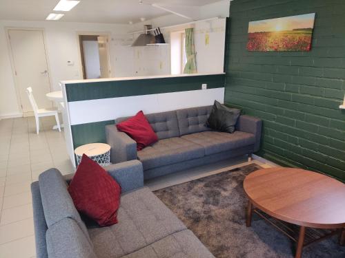 Χώρος καθιστικού στο Vakantiehuis De Maretak vlakbij Brugge & de kust