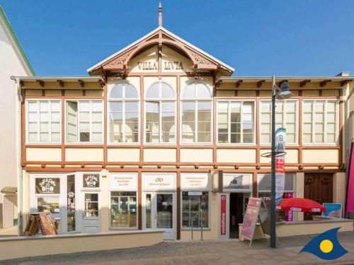 a large building with a lot of windows at Villa Livia Whg 13 in Ahlbeck