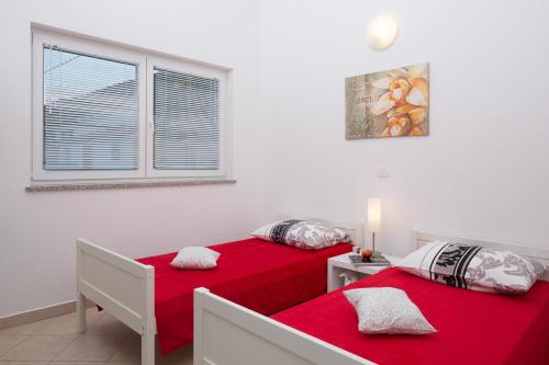 Posteľ alebo postele v izbe v ubytovaní Apartment Panoramica - Ravni