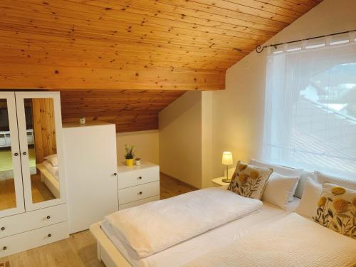 Postel nebo postele na pokoji v ubytování Casa Mia