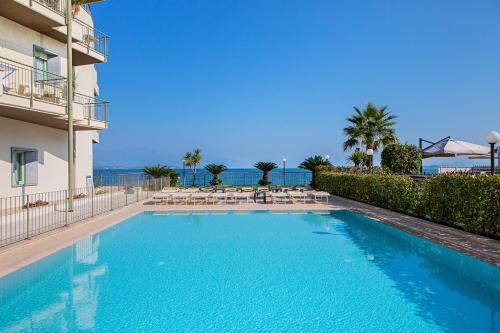 The swimming pool at or close to Residenza Miralago by Wonderful Italy