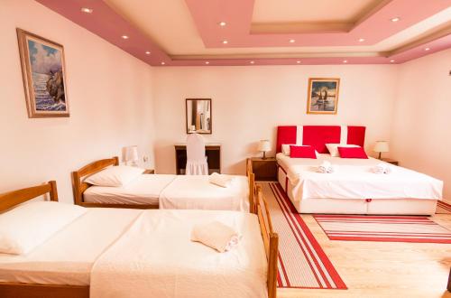 Ein Bett oder Betten in einem Zimmer der Unterkunft Villa Medo