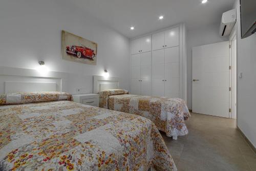 A bed or beds in a room at Villa Son Blanc Grupo Seranova Luxury Hotel