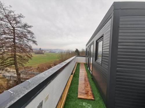 a view from the balcony of a house at Roof Apartment ART-PE in Trebnje