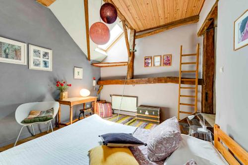 Postel nebo postele na pokoji v ubytování Au Gré des Vents - Gîtes et Chambres d'hôtes