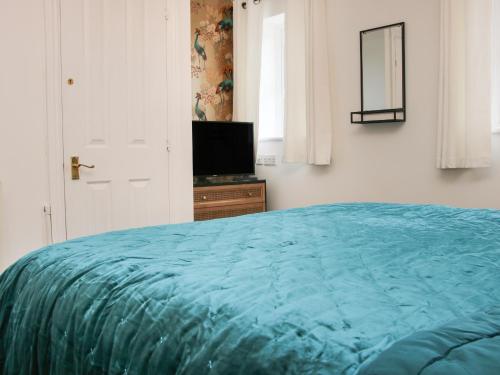 Ein Bett oder Betten in einem Zimmer der Unterkunft Pippin's Place