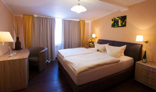 Weinhotel Sonnenscheinにあるベッド
