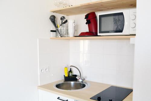 Dapur atau dapur kecil di Studio Cosy Bordeaux - Parking privé - Netflix - Tram A
