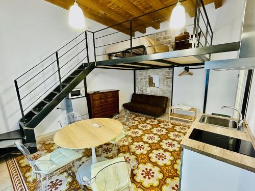 Kuchyň nebo kuchyňský kout v ubytování Palazzo Lupicini Affittacamere
