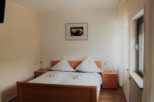 Gasthof Via Vita tesisinde bir odada yatak veya yataklar