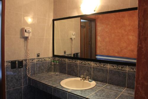 Koupelna v ubytování Hotel Meson del Puente