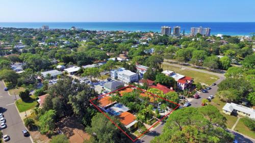 an aerial view of a city with a building at Tropical Villas Of Venice Beach in Venice