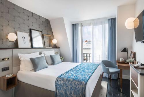 Ein Bett oder Betten in einem Zimmer der Unterkunft Best Western Plus La Demeure