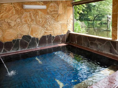 Swimmingpoolen hos eller tæt på Pension Kinrinko Toyonokuni