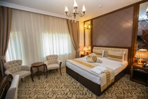 Postel nebo postele na pokoji v ubytování Atlas Hotel Baku