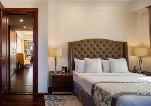 a bedroom with a large bed in a room at The Indus Valley in Leh