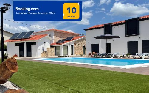 a rendering of a house with a swimming pool at Casa GANCHINHO in Santiago da Guarda