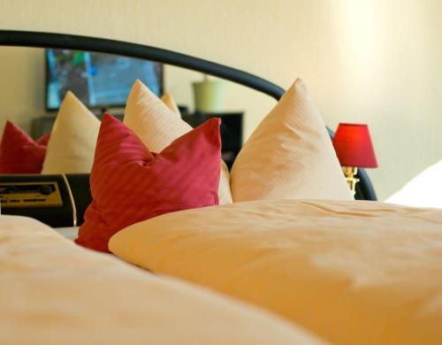 Cama o camas de una habitación en Gasthof Metzgerei Stöberl