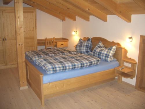 Posteľ alebo postele v izbe v ubytovaní Huberbauernhof Ferienwohnungen