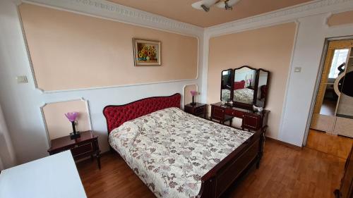 En eller flere senge i et værelse på Guest House Anna