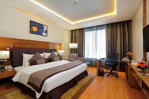 Yashail Hotel Haridwarにあるベッド