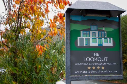 a sign for the lookout in a park at The Lookout Keswick in Keswick
