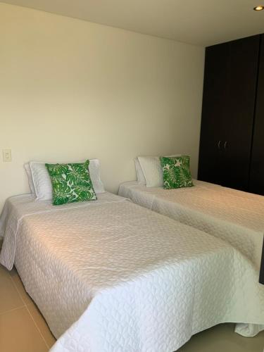 Krevet ili kreveti u jedinici u objektu Apartamento en Cartagena frente a la playa de Marbella entre el aeropuerto y el centro histórico