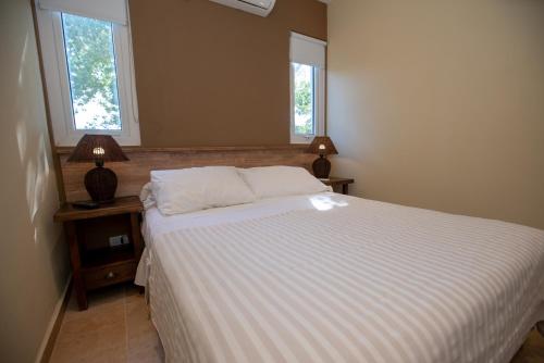 Katil atau katil-katil dalam bilik di Hotel Viña del Mar
