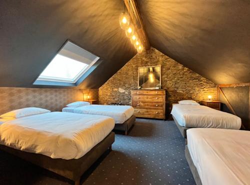 Postel nebo postele na pokoji v ubytování Le Tri Renard Spa