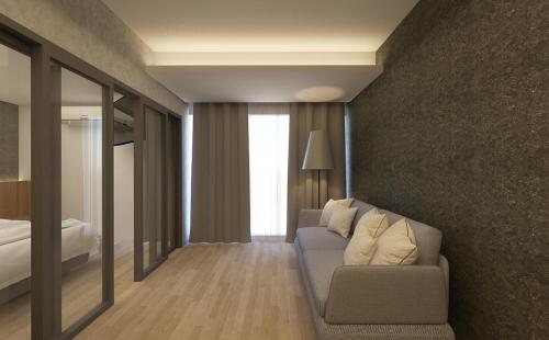 Postel nebo postele na pokoji v ubytování Zone Hotel Ipoh