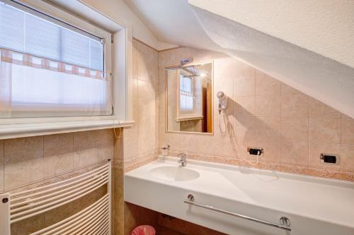 Een badkamer bij Chalet Betty Appartamento Sgembro