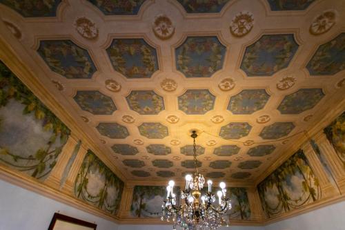 a chandelier hanging from the ceiling of a building at Sant'Ivo Apartments in Rome