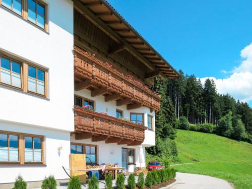 a building with balconies on the side of it at Apartment Moarerlechenhof - FGZ336 by Interhome in Hart im Zillertal