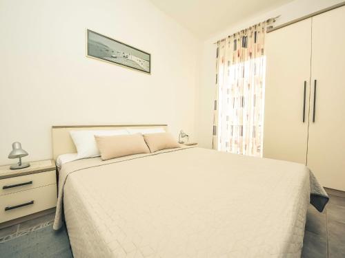 Postel nebo postele na pokoji v ubytování Apartment Snježana-3 by Interhome