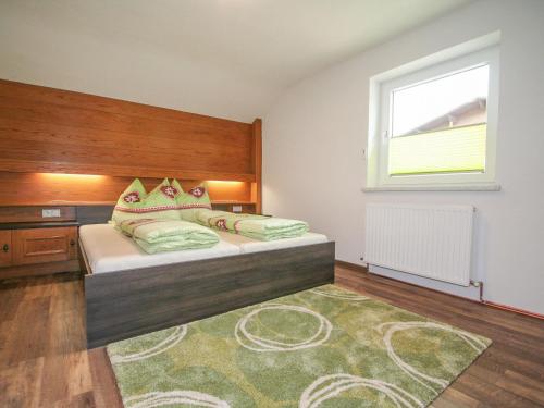 Postel nebo postele na pokoji v ubytování Holiday Home Mitzi by Interhome