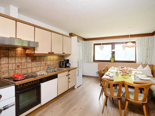 A kitchen or kitchenette at Holiday Home Berghof Reich by Interhome