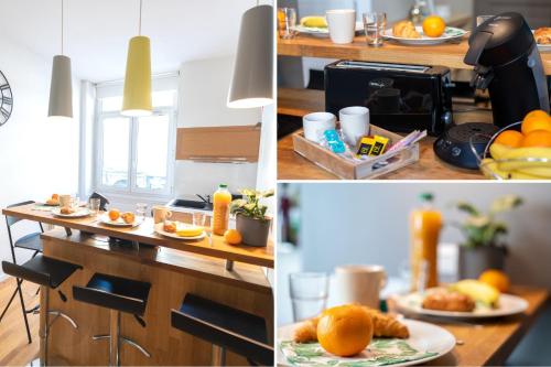 een keuken met een bord sinaasappels op een aanrecht bij KASA AMAZUR - Centre ville & Cosy in Saint-Étienne