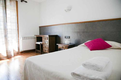 Ένα ή περισσότερα κρεβάτια σε δωμάτιο στο Casa La Lourdes