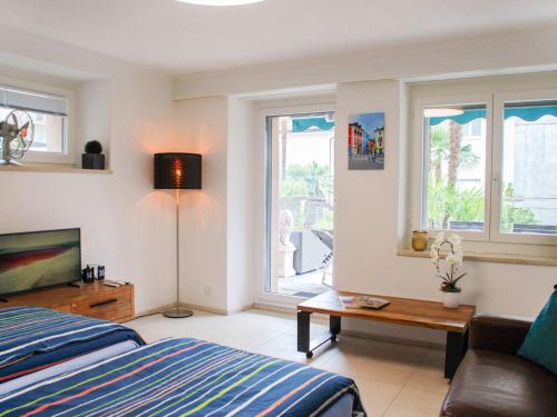 Ένα ή περισσότερα κρεβάτια σε δωμάτιο στο Apartment Appartamento 2- Giardino by Interhome