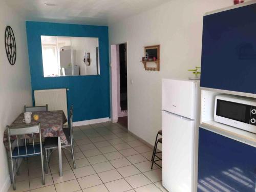 Appartement charmant à Dieulouard, 75 m² avec Parkingにあるキッチンまたは簡易キッチン