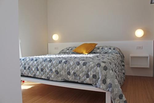Ένα ή περισσότερα κρεβάτια σε δωμάτιο στο Luxuryhouse Boboetto