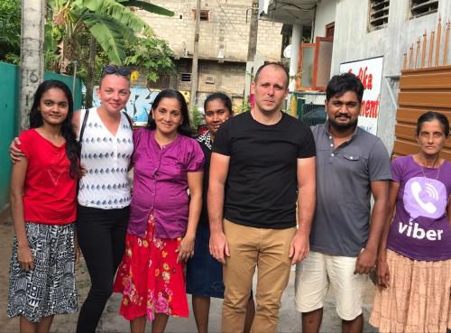 a group of people posing for a picture at Indika's Apartment in Hikkaduwa