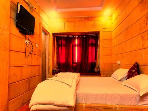 Hotel Jaswant Palaceにあるベッド