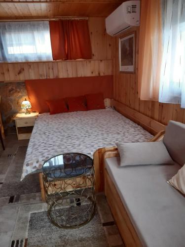 Postel nebo postele na pokoji v ubytování Mátyás Apartman