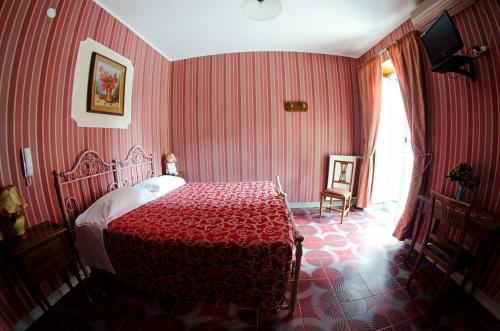 Letto o letti in una camera di Hotel Villa Maria