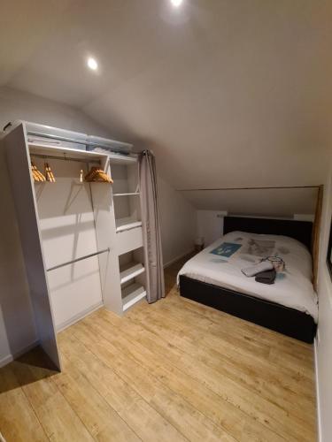 Cama o camas de una habitación en Wood loft by Mulhouse