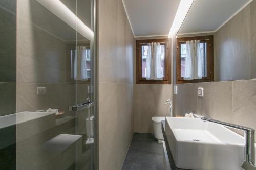 Kúpeľňa v ubytovaní Residenza Pomponi Deluxe